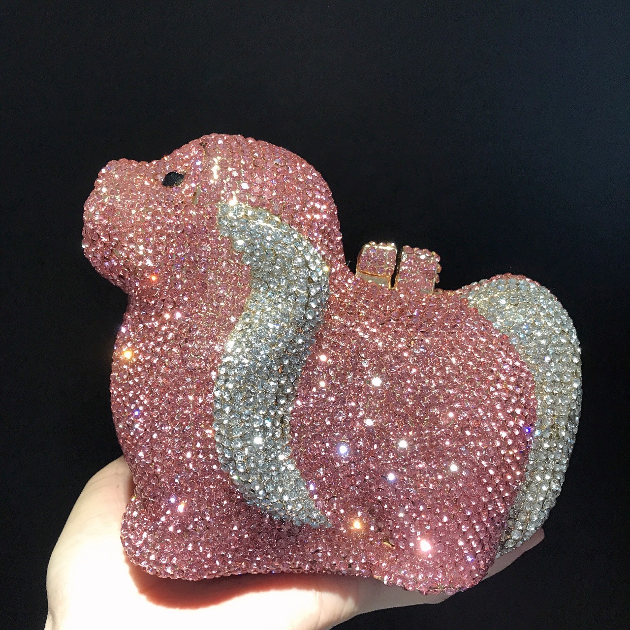 pink dog-shaped crystal clutch